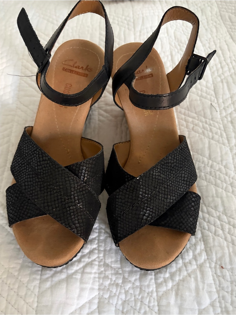 Clarks Women’s Black Leather Cross-Strap wedge Sandals